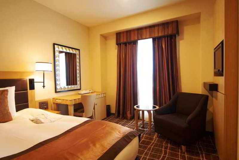 Doubletree By Hilton Naha Hotel Стая снимка